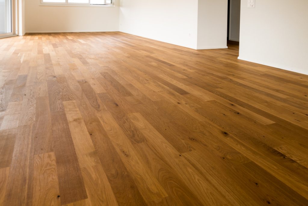 Beautiful wooden floor in a new apartment before moving in